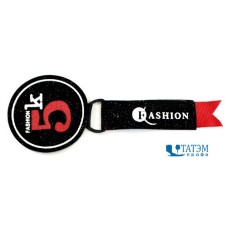 Лейбл пришивной диам. 55 мм с эффектом песка 